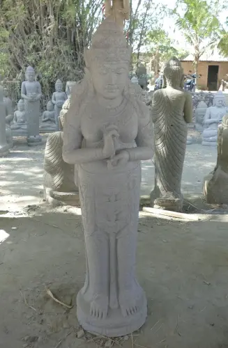 Product image of the product “Standing Dewi Sri, position greetings turning the wheel ,160cm high riverstone grey ”